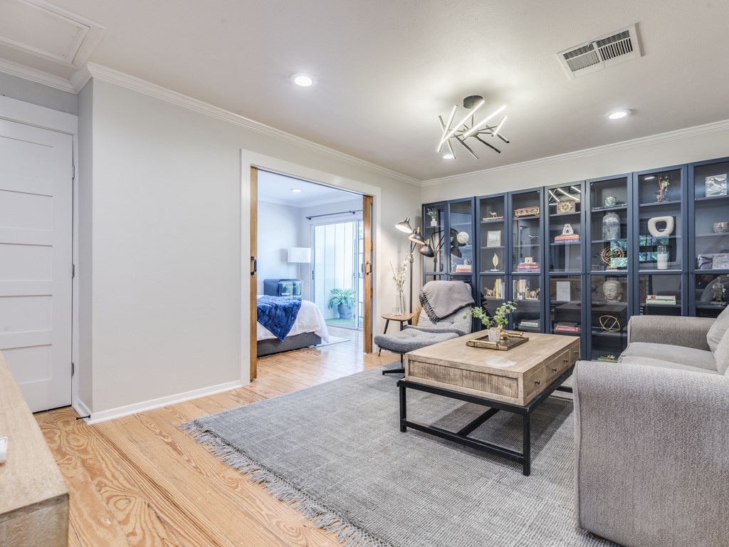500 East Riverside Drive, Unit 206 Austin, TX 78704 - Photo 12 of 32 Sitting room with crown molding, light wood-style floors, and recessed lighting