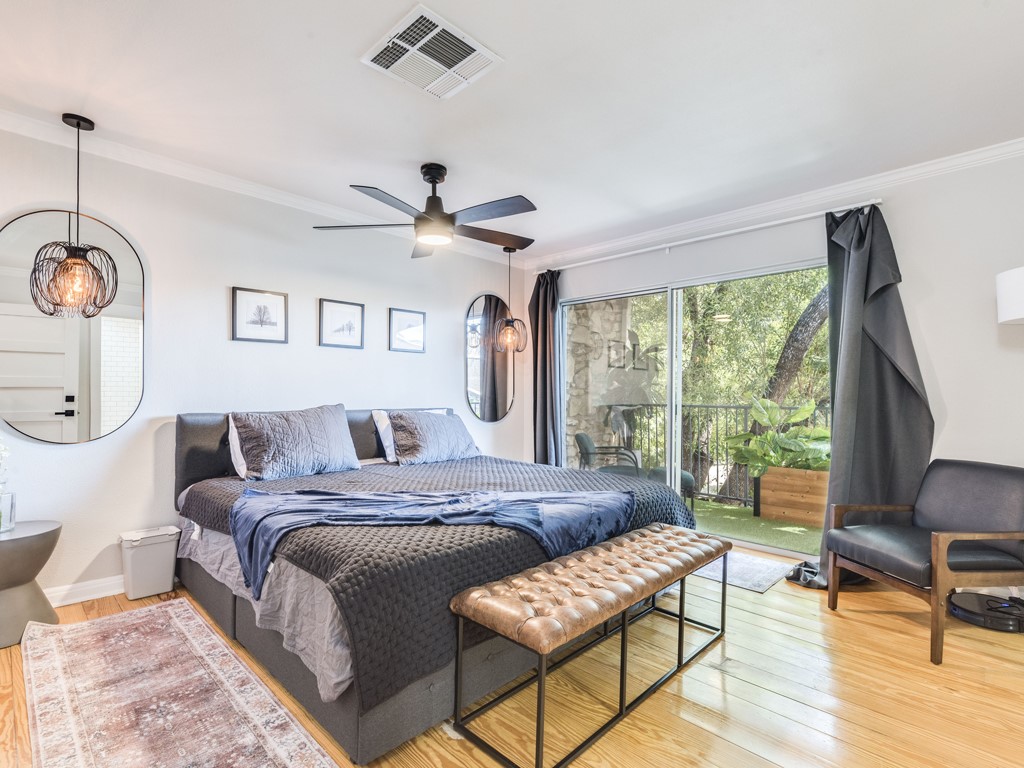 500 East Riverside Drive, Unit 206 Austin, TX 78704 - Photo 14 of 32 Bedroom with ornamental molding, light wood-style floors, access to exterior, and a ceiling fan