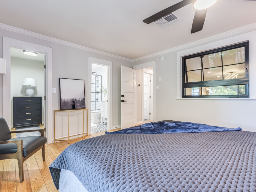 500 East Riverside Drive, Unit 206 Austin, TX 78704 - Photo 15 of 32 Bedroom with light wood-type flooring, crown molding, and ceiling fan