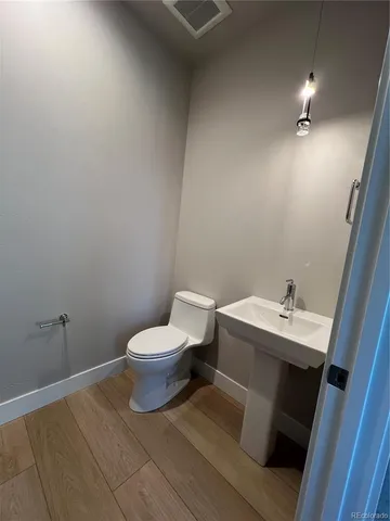 a bathroom with a sink and a toilet