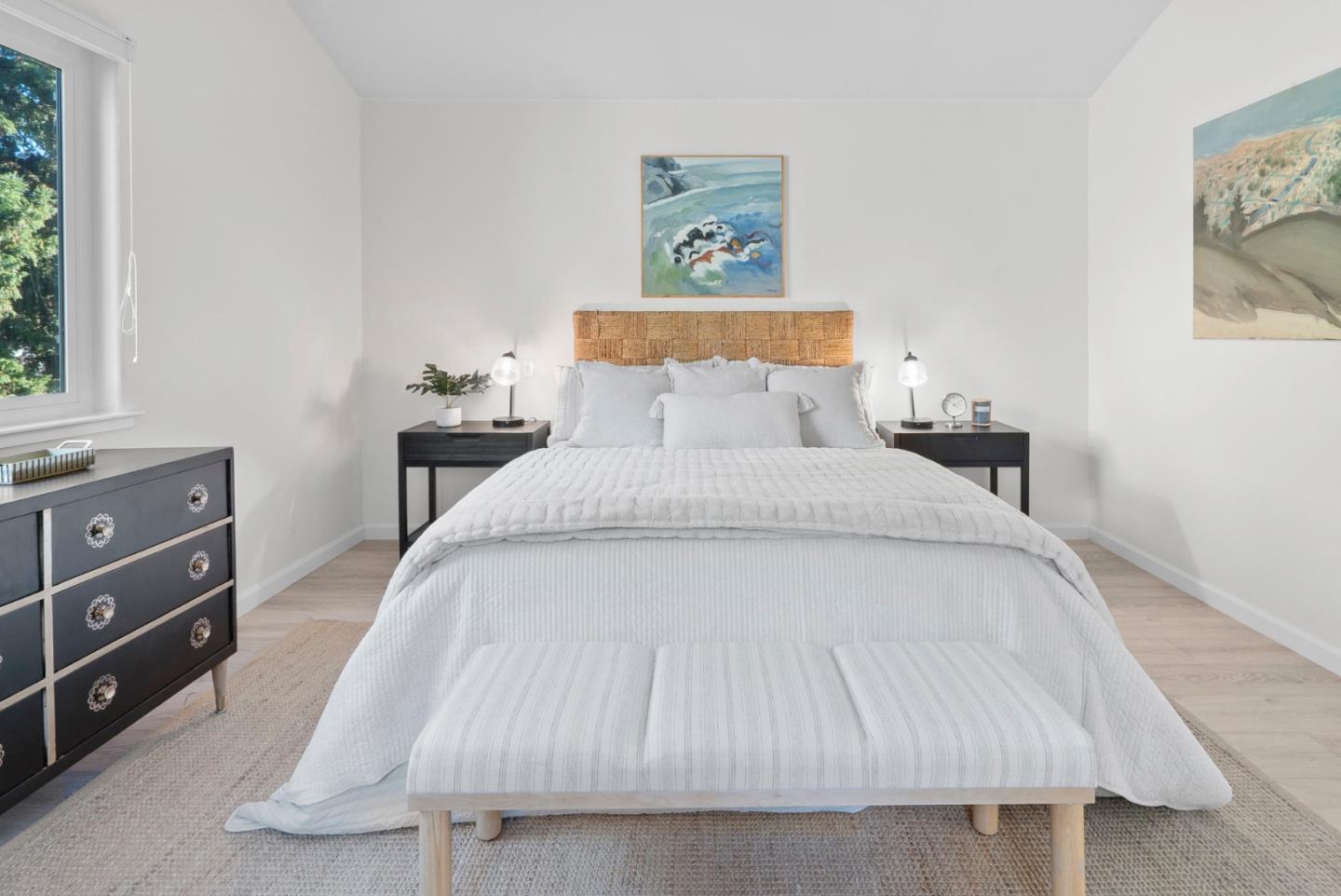 270 Carrera Circle Aptos, CA 95003 - Photo 18 of 42 a spacious bedroom with a bed and a window