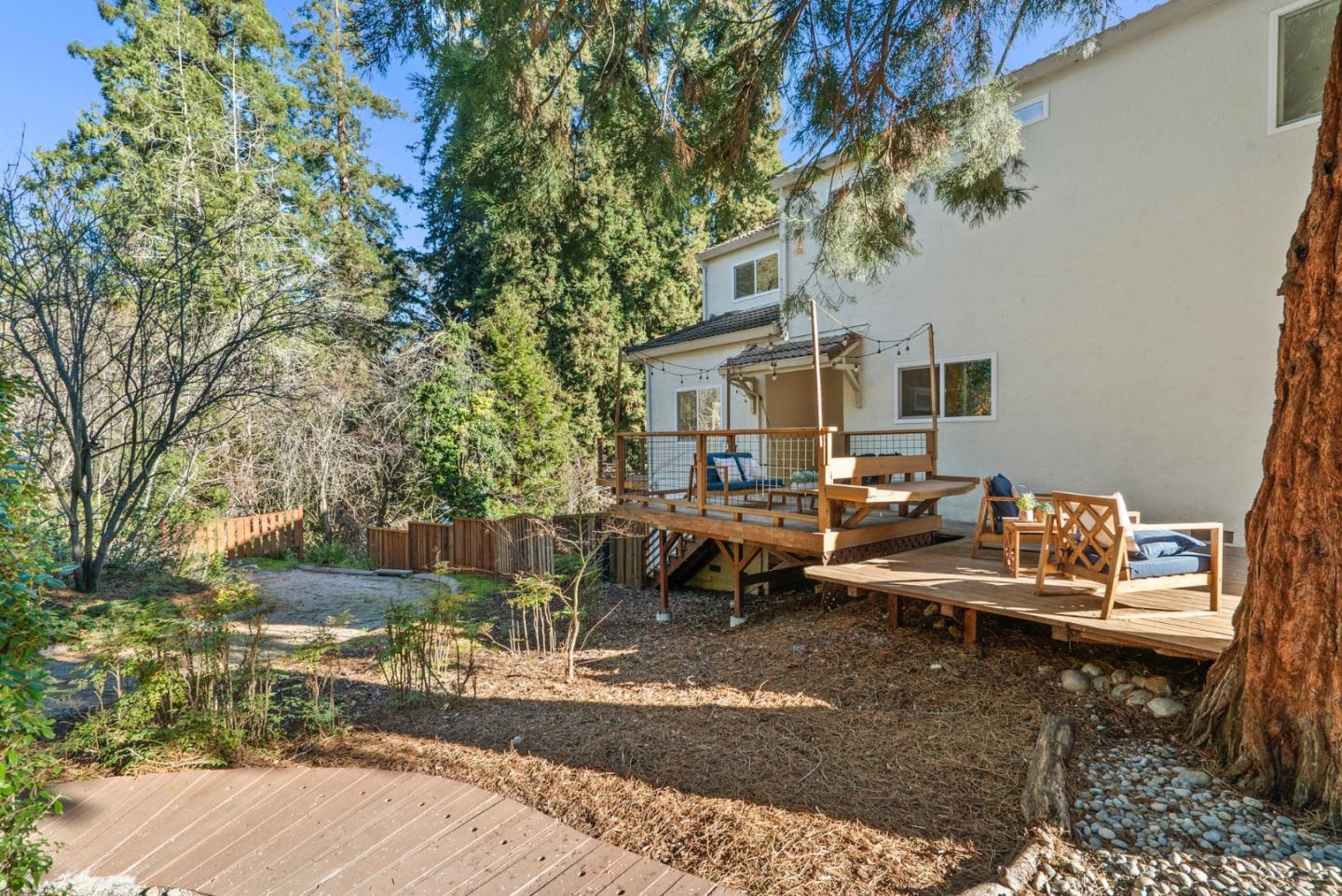 270 Carrera Circle Aptos, CA 95003 - Photo 29 of 42 a view of a patio with a table and chairs under an umbrella