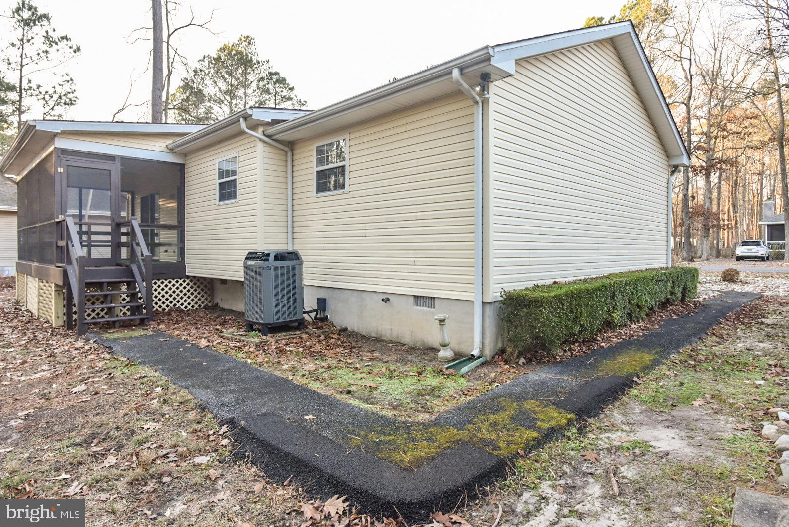 61 Abbyshire Road Ocean Pines, MD 21811 - Photo 2 of 2 a view of a house with a yard and garage