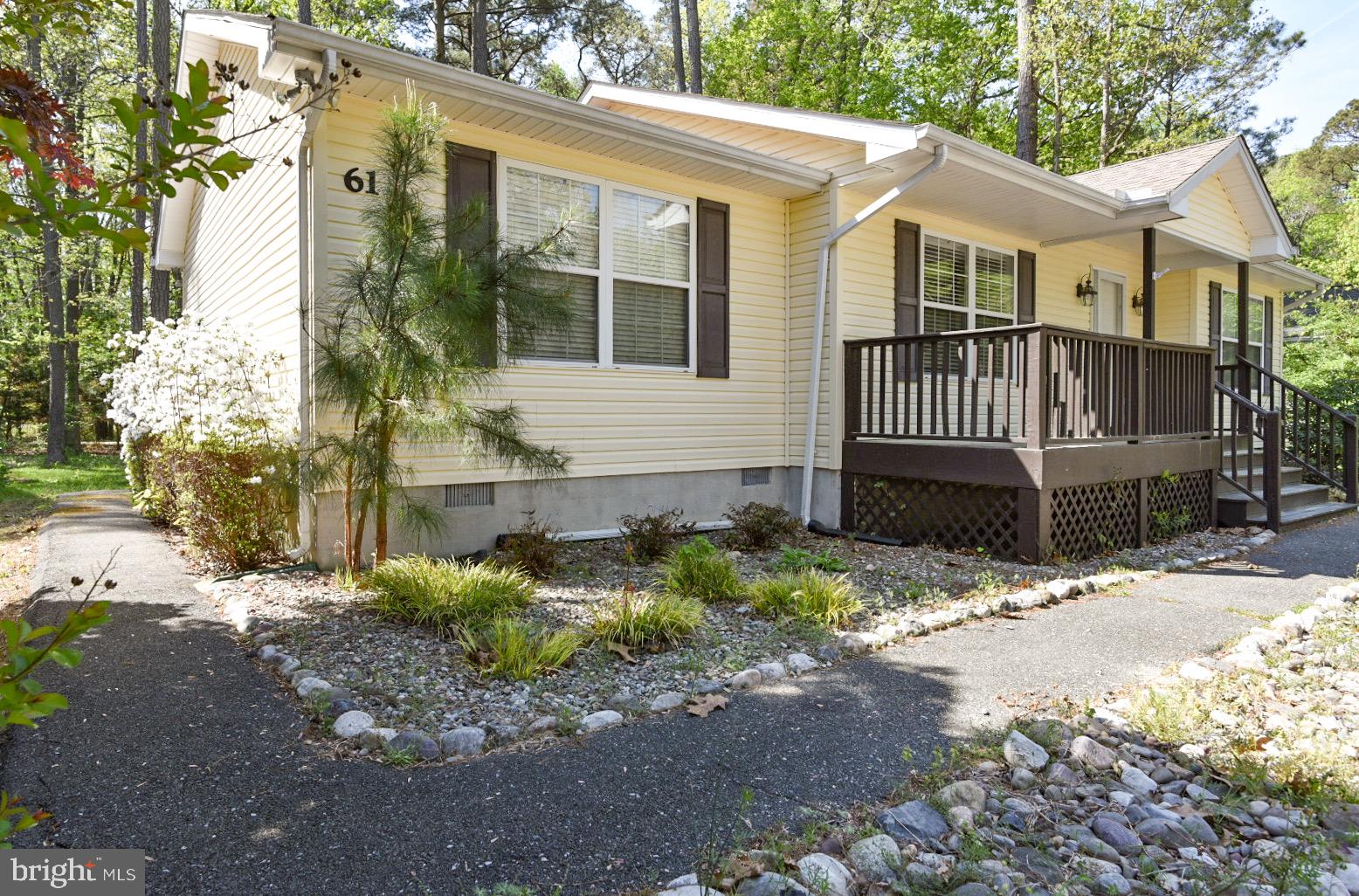 61 Abbyshire Road Ocean Pines, MD 21811 - Photo 21 of 40 a front view of a house with a yard
