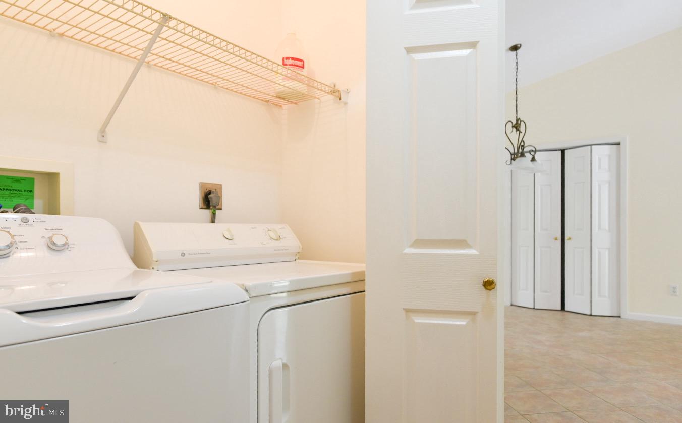 61 Abbyshire Road Ocean Pines, MD 21811 - Photo 31 of 40 a utility room with dryer and washer