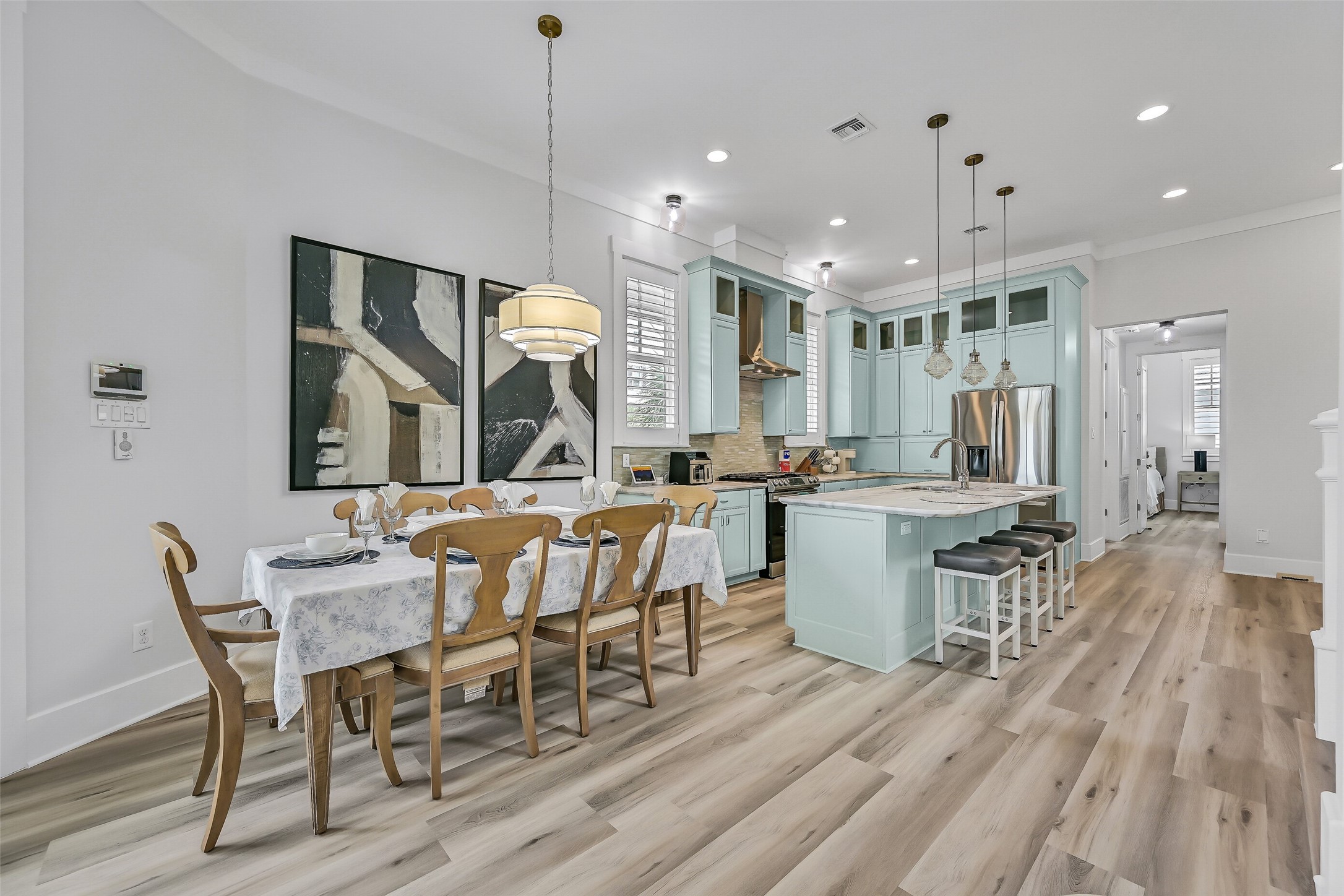 817 Positano Road Galveston, TX 77550 - Photo 14 of 50 With spacious seating and easy flow into the kitchen, this gathering space was designed for making memories. Enhanced by updated furnishings and beautiful new flooring, every detail supports relaxed coastal living and effortless entertaining.