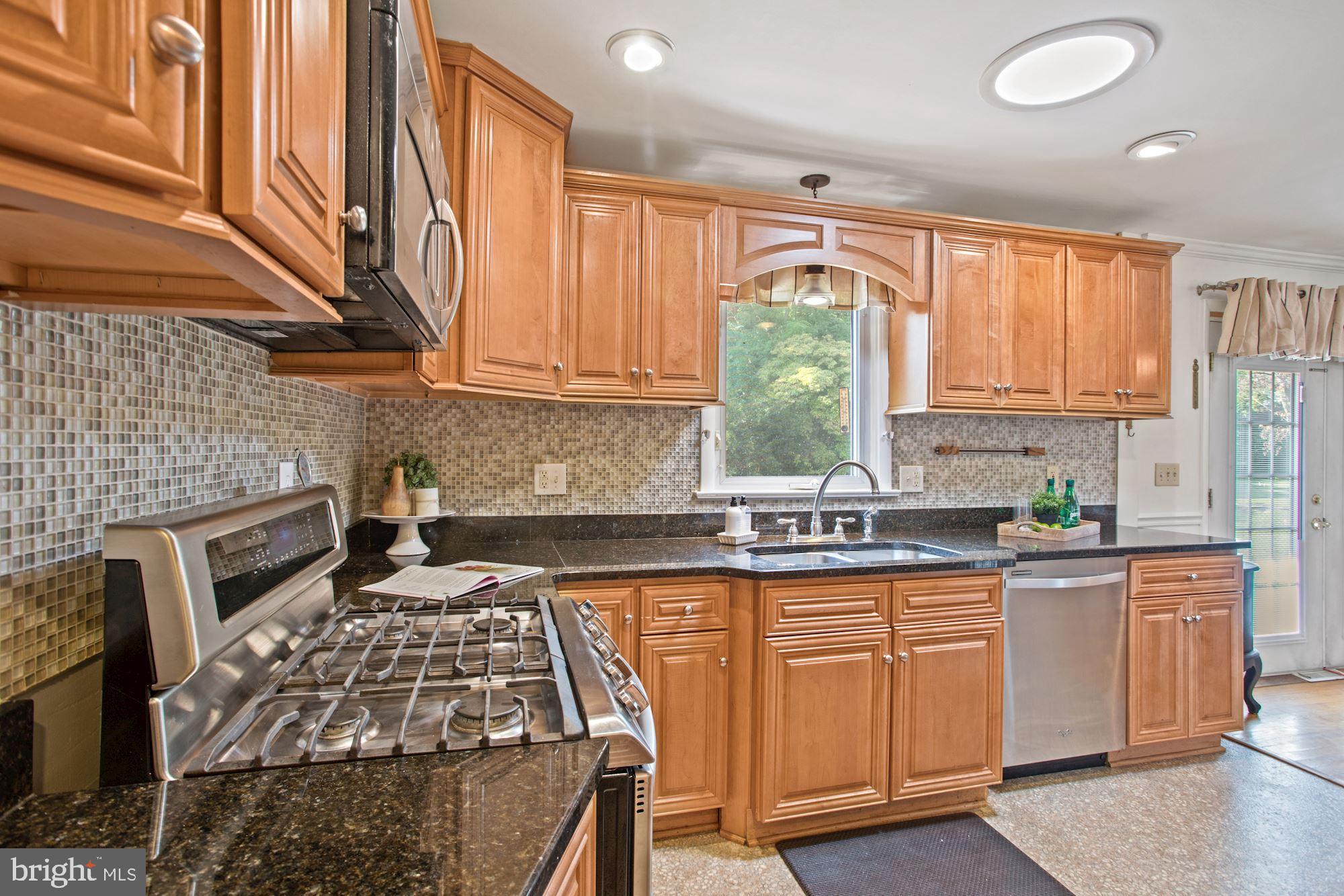 Gourmet kitchen with solar tunnel skylight