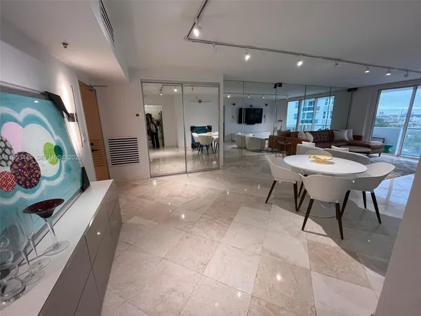 a view of a dining room with furniture