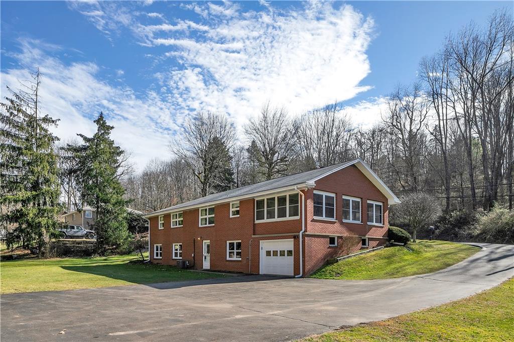 545 Conway Wallrose Road Freedom, PA 15042 - Photo 5 of 43 a front view of house with yard and green space