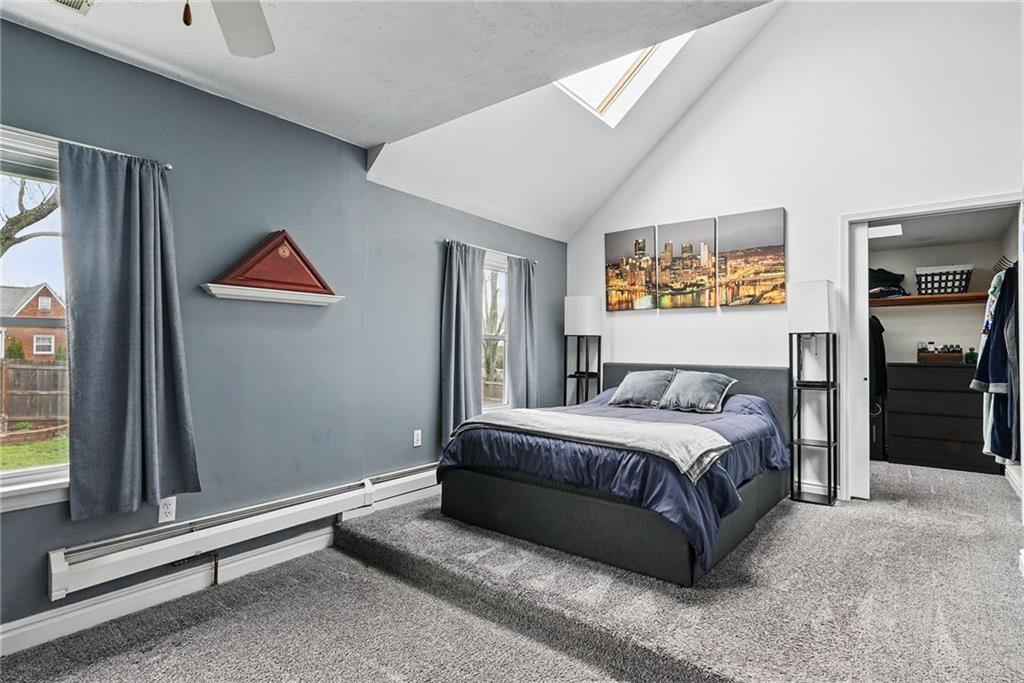 3305 Harding Avenue Aliquippa, PA 15001 - Photo 15 of 40 a bedroom with a bed and a painting on the wall