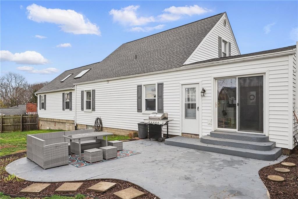3305 Harding Avenue Aliquippa, PA 15001 - Photo 34 of 40 a view of a patio with couches table and chairs and potted plants