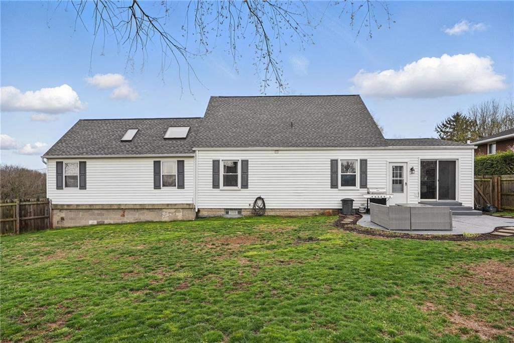 3305 Harding Avenue Aliquippa, PA 15001 - Photo 36 of 40 a front view of a house with a garden and patio