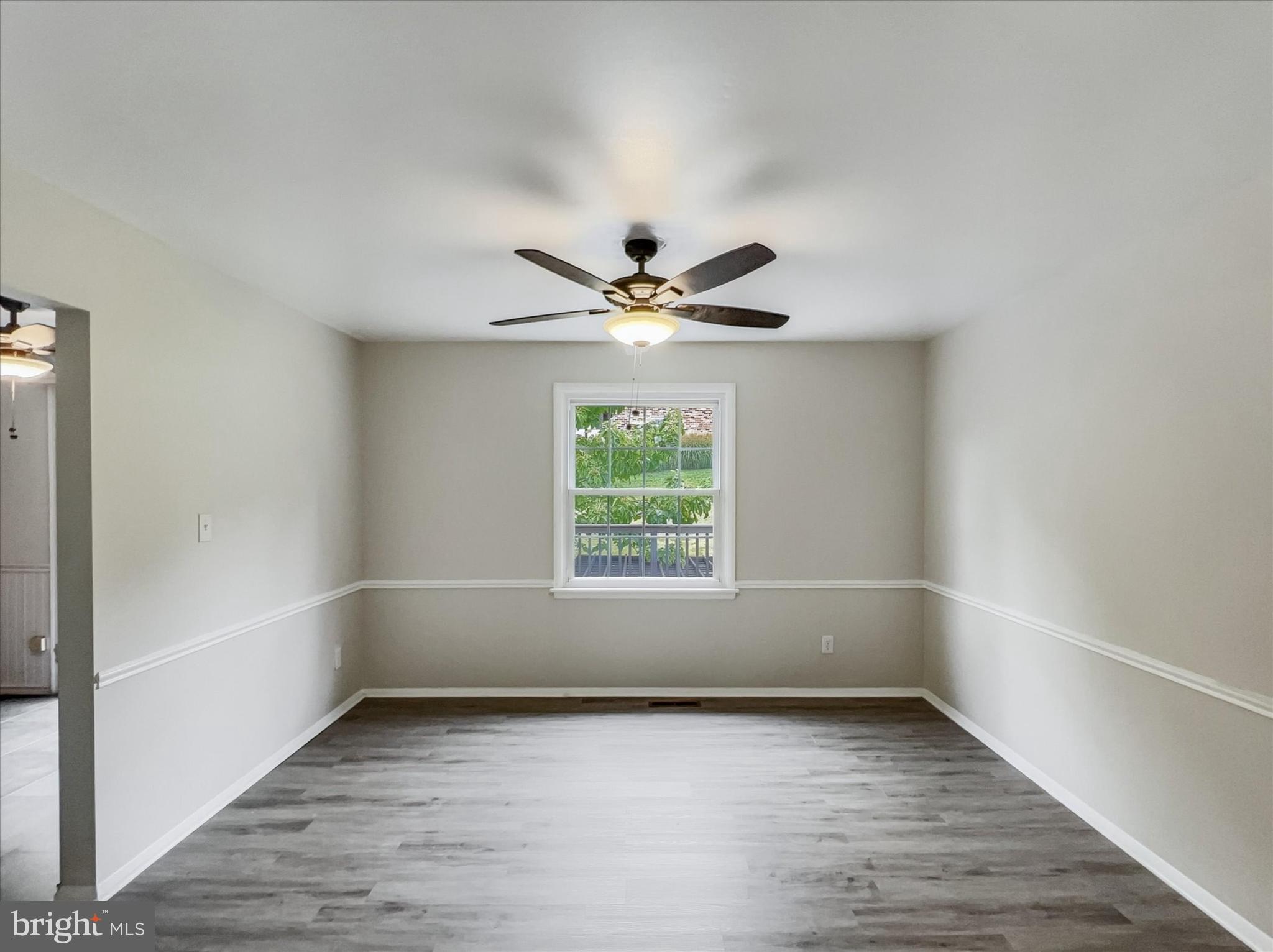 2618 Jonathan Road Ellicott City, MD 21042 - Photo 6 of 32 a view of an empty room with a window