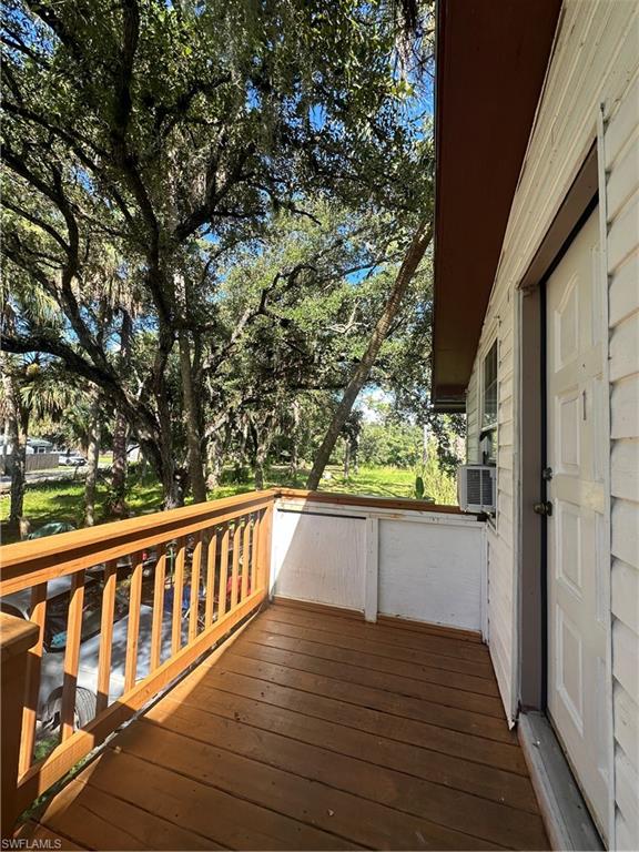 18301 Slater Road North Fort Myers, FL 33917 - Photo 12 of 17 a view of balcony with wooden floor