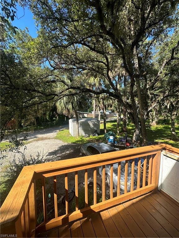 18301 Slater Road North Fort Myers, FL 33917 - Photo 13 of 17 a view of a yard with wooden fence