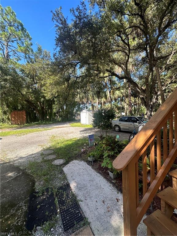 18301 Slater Road North Fort Myers, FL 33917 - Photo 17 of 17 a view of swimming pool with a yard
