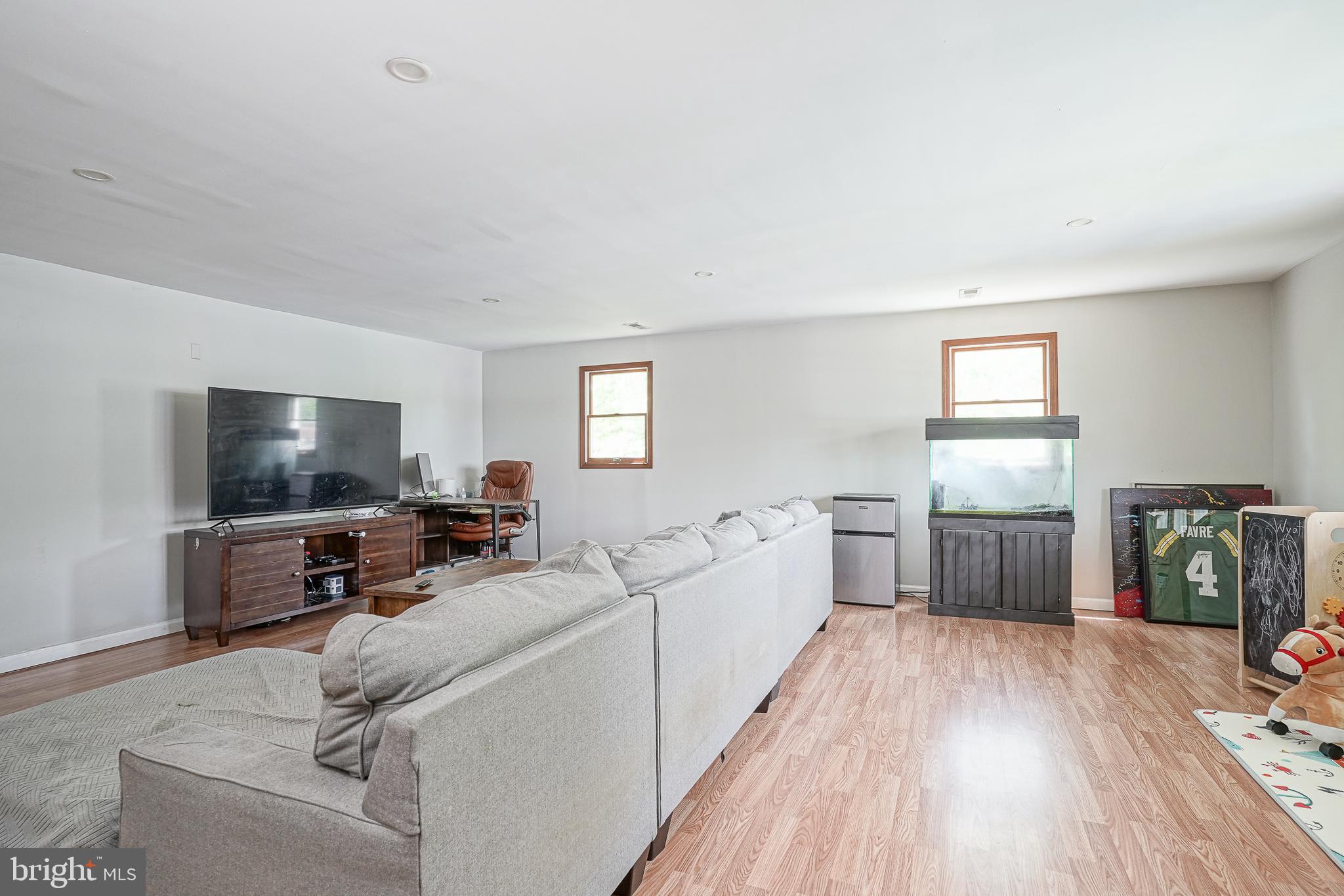 541 Windsor Avenue Maple Shade, NJ 08052 - Photo 11 of 21 a living room with furniture and a flat screen tv