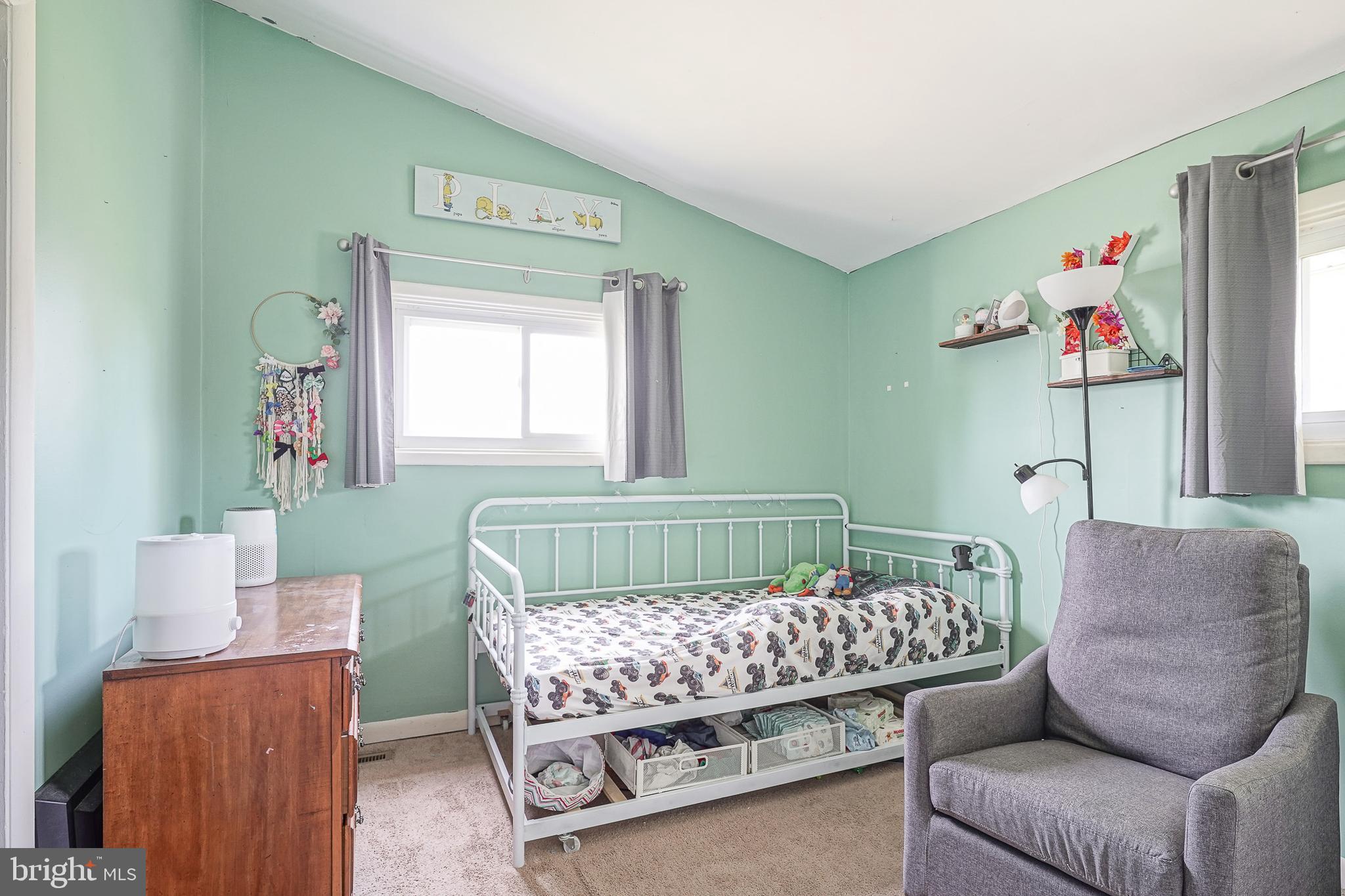 541 Windsor Avenue Maple Shade, NJ 08052 - Photo 17 of 21 a bedroom with a bed and a window