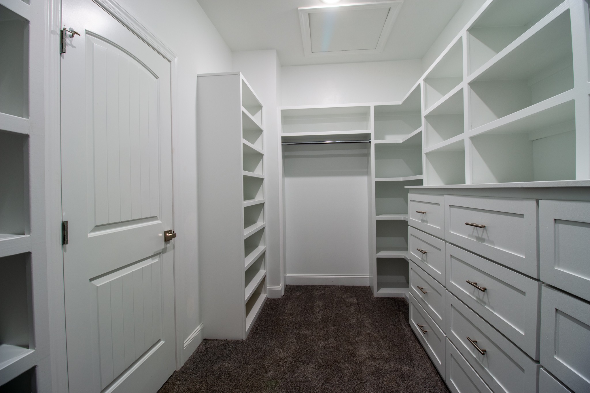 935 South Cross Bridges Road Mount Pleasant, TN 38474 - Photo 13 of 44 a view of walk in closet with empty racks