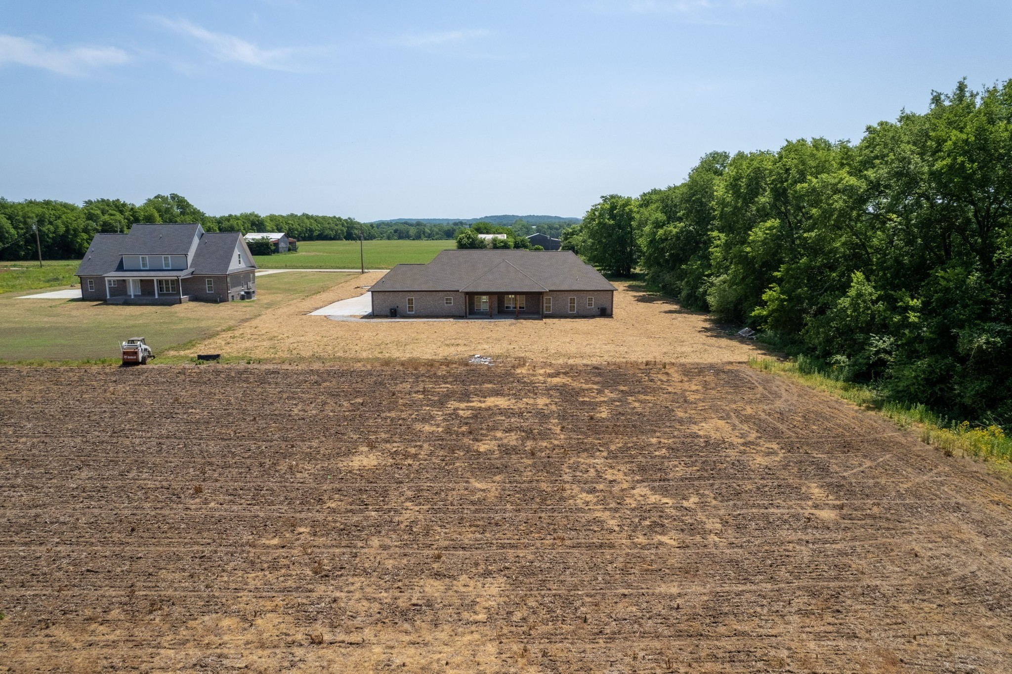 935 South Cross Bridges Road Mount Pleasant, TN 38474 - Photo 34 of 44 a backyard of a house with lots of green space