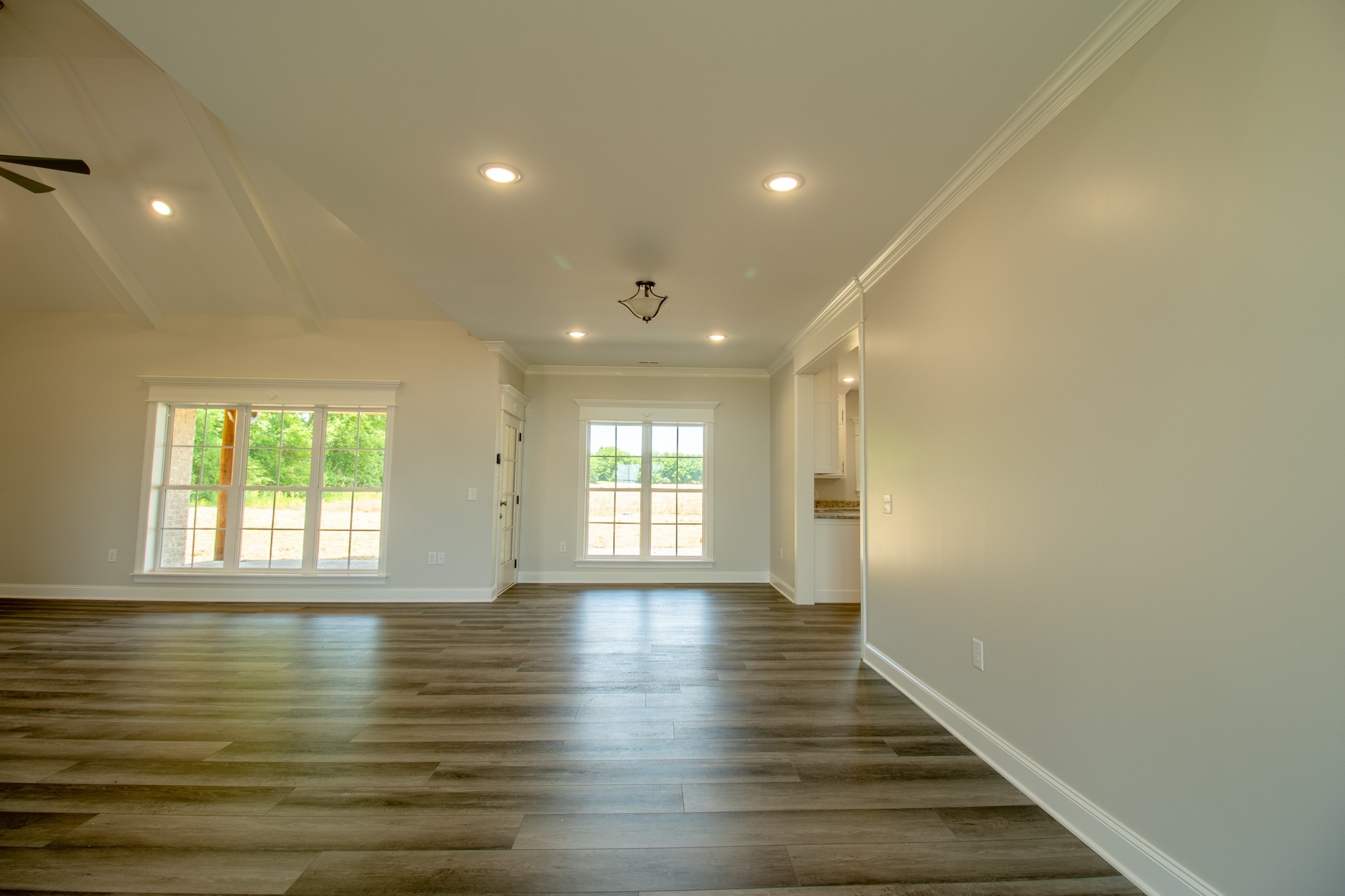935 South Cross Bridges Road Mount Pleasant, TN 38474 - Photo 8 of 44 a view of empty room with wooden floor and fan