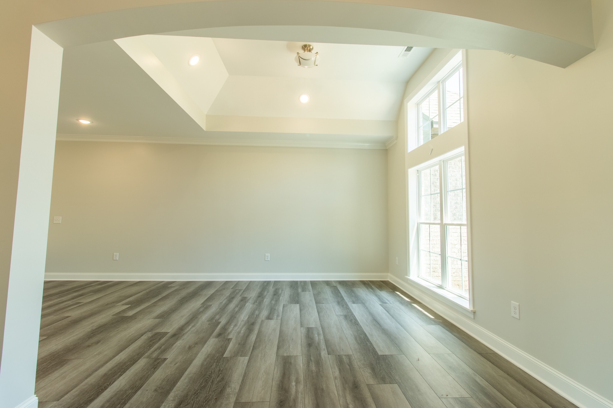 935 South Cross Bridges Road Mount Pleasant, TN 38474 - Photo 10 of 44 a view of a room with wooden floor and windows