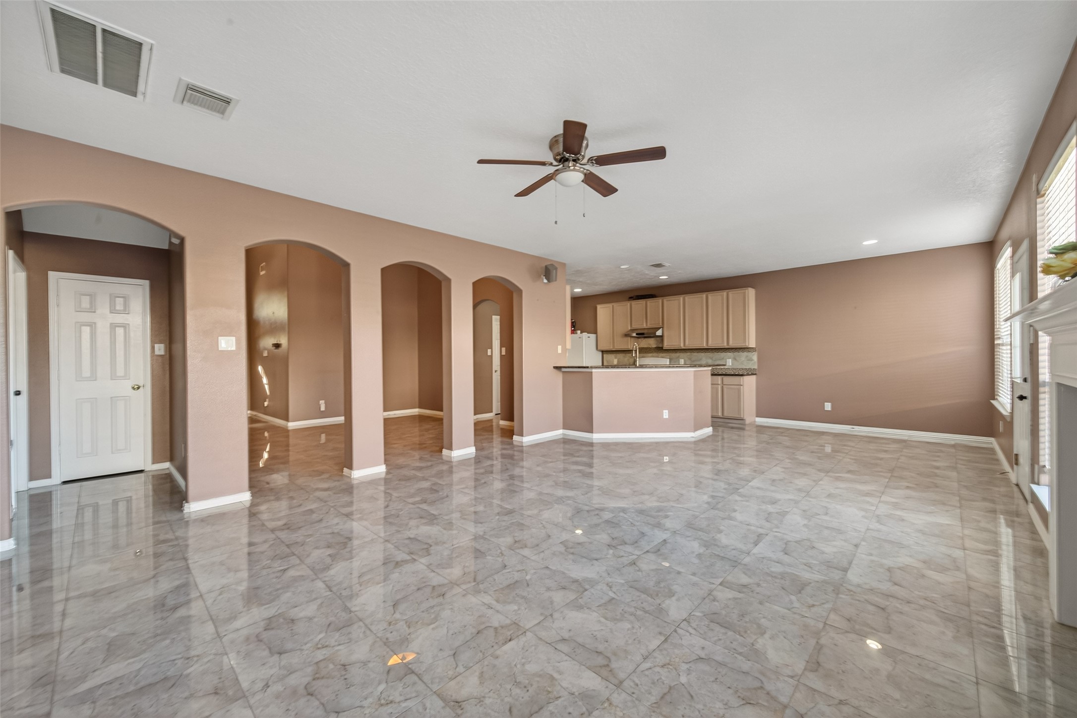 18818 Flagstone Creek Road Houston, TX 77084 - Photo 23 of 47 a view of a kitchen with a sink and a refrigerator