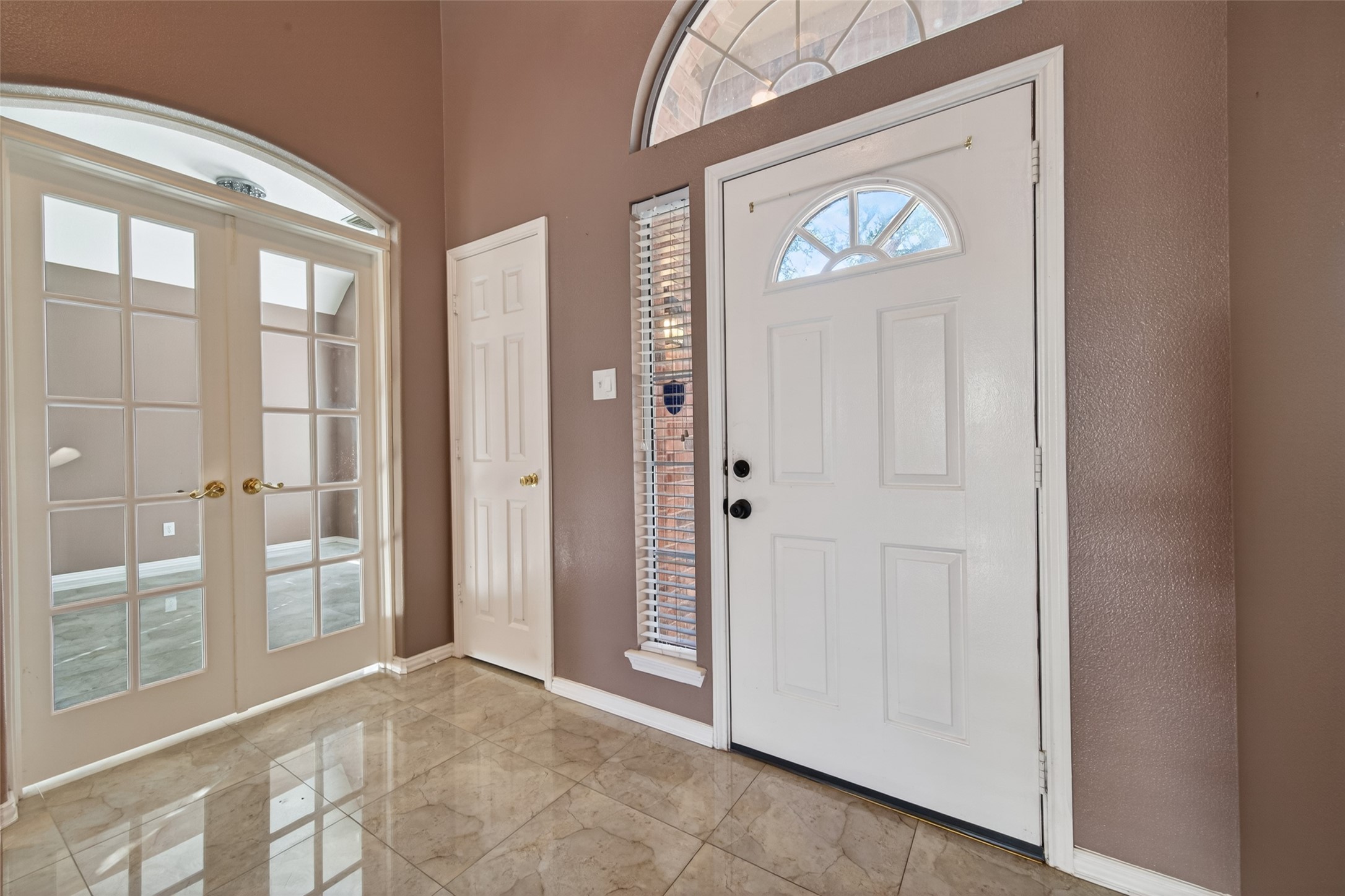 18818 Flagstone Creek Road Houston, TX 77084 - Photo 5 of 47 a view of a hallway with wooden door