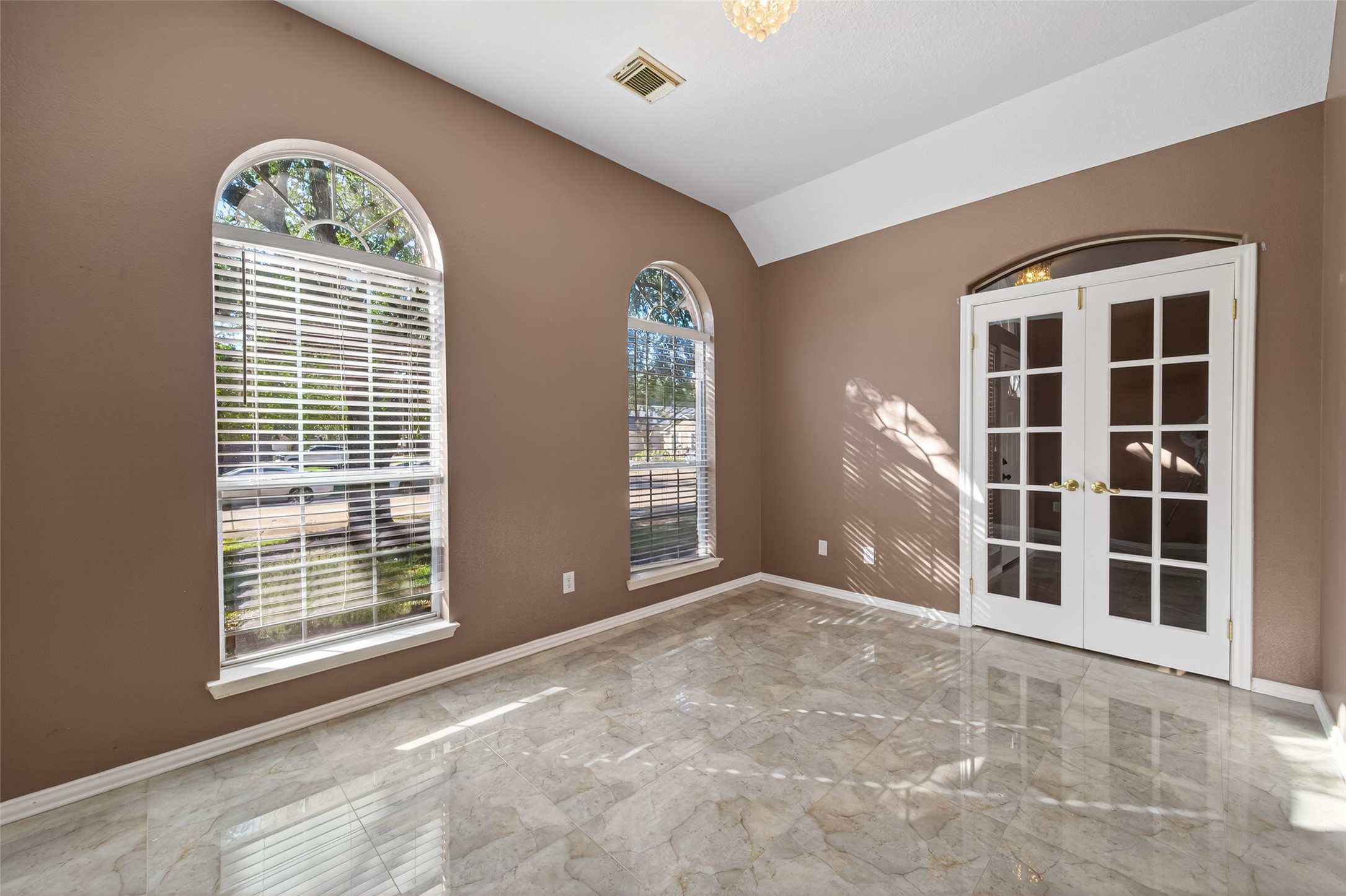 18818 Flagstone Creek Road Houston, TX 77084 - Photo 7 of 47 a view of an empty room with a window