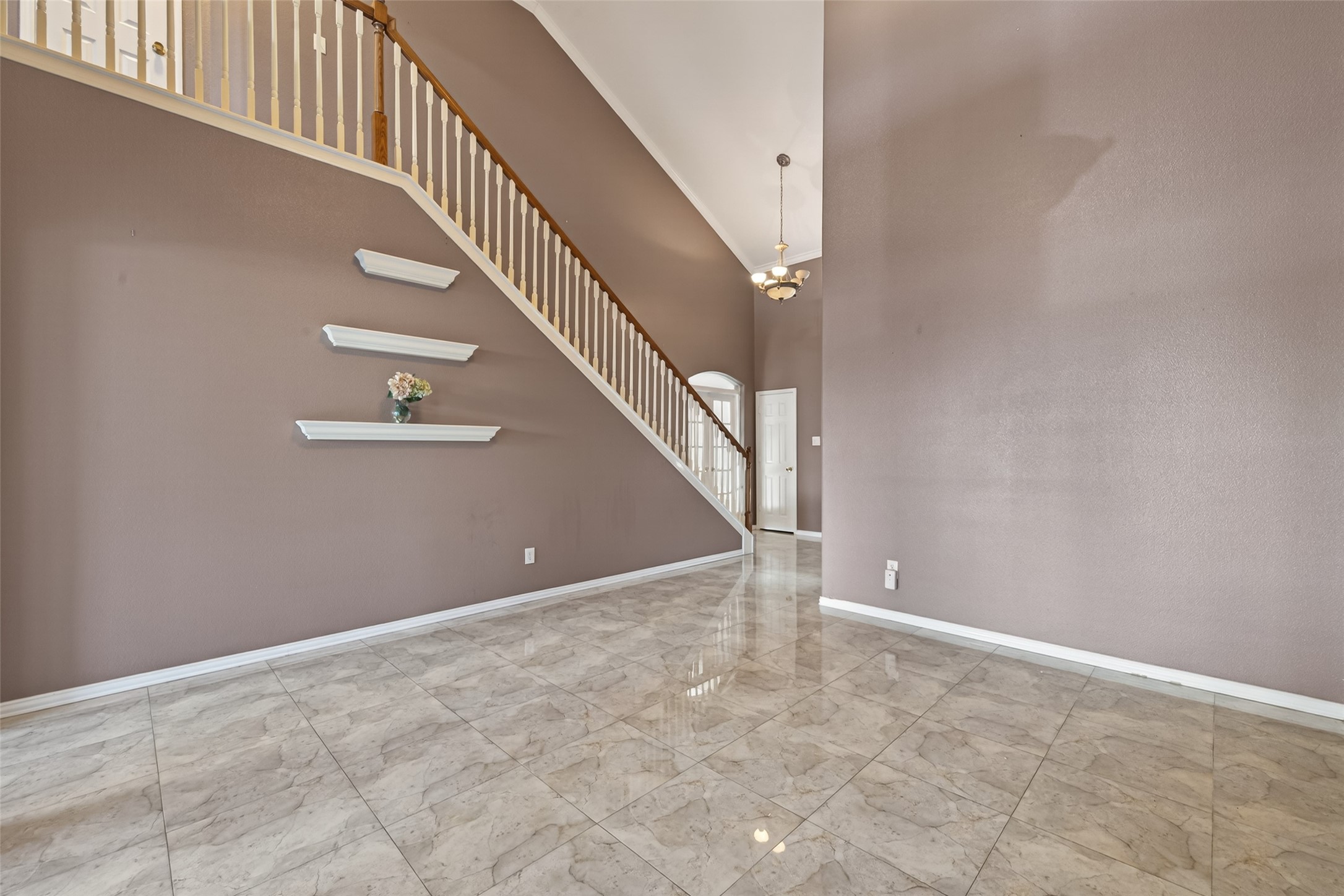 18818 Flagstone Creek Road Houston, TX 77084 - Photo 10 of 47 a view of an entryway with staircase