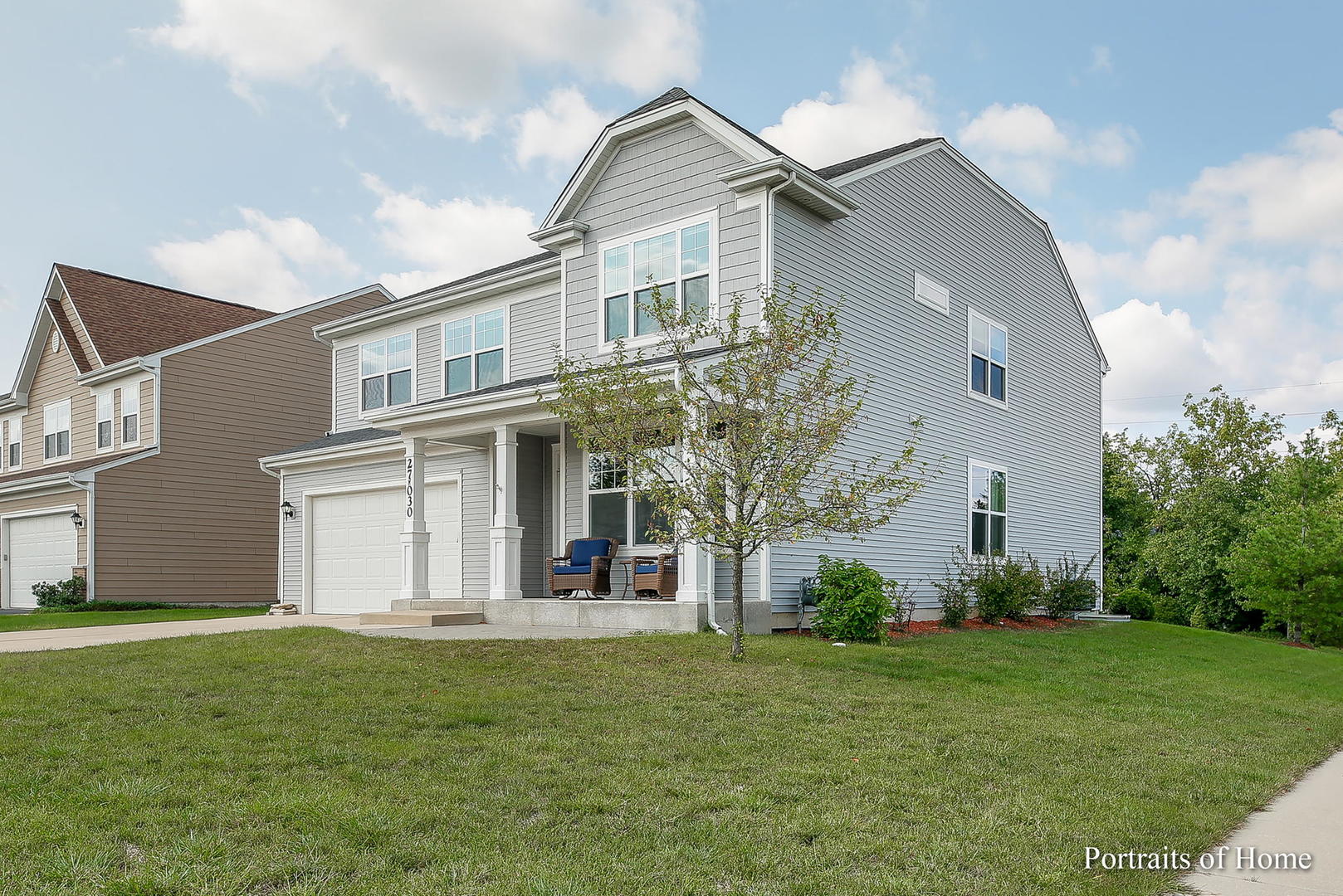 27-w030 Churchill Road Winfield, IL 60190 - Photo 2 of 28 a front view of a house with a garden