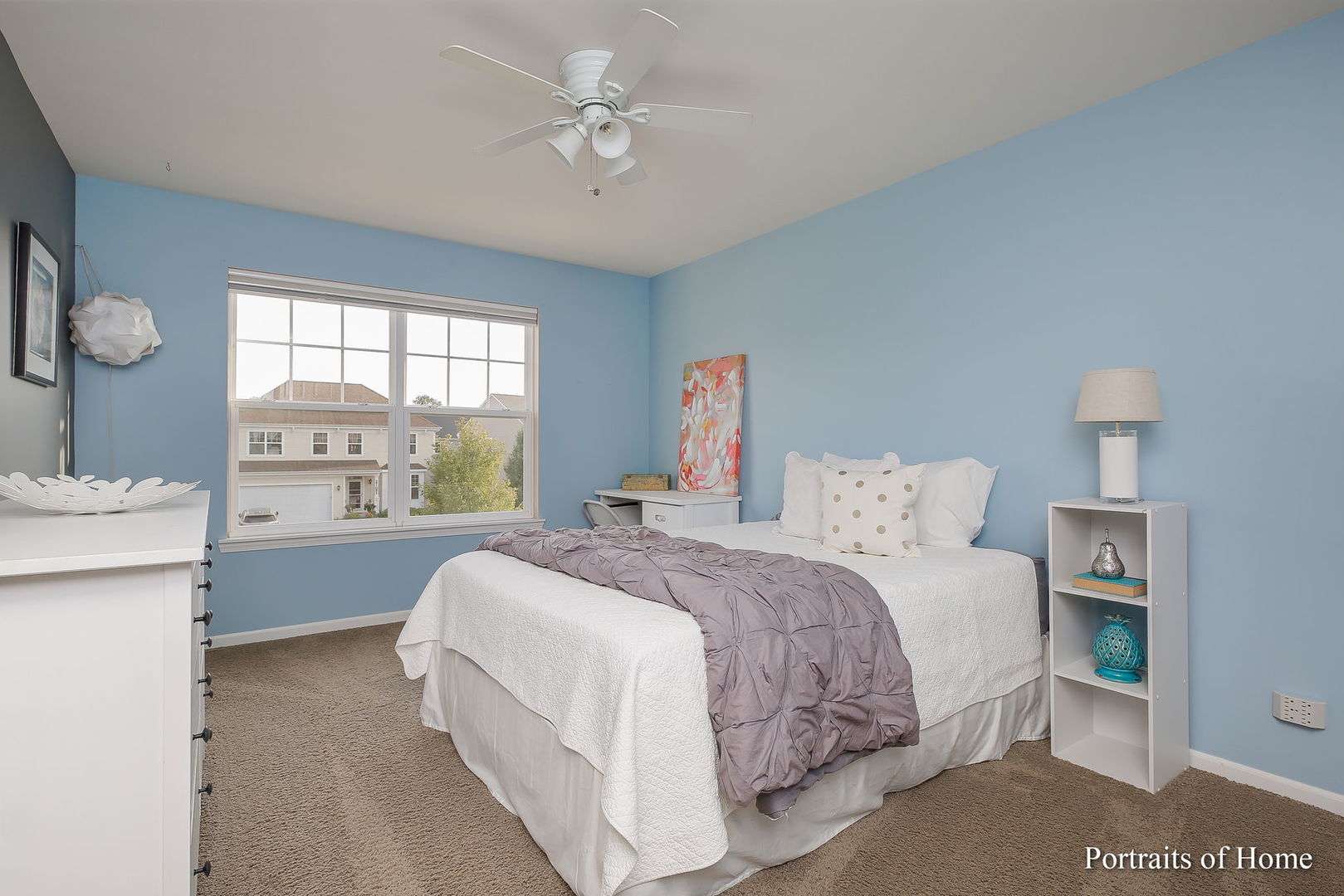 27-w030 Churchill Road Winfield, IL 60190 - Photo 21 of 28 a spacious bedroom with a bed and a table