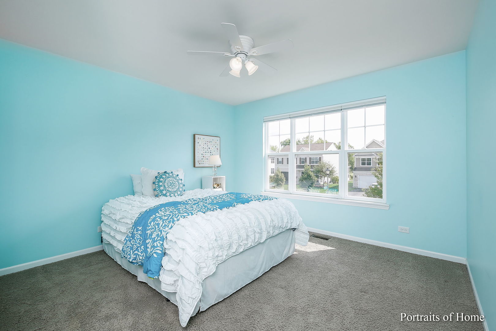 27-w030 Churchill Road Winfield, IL 60190 - Photo 23 of 28 a bed sitting in a bedroom next to a window