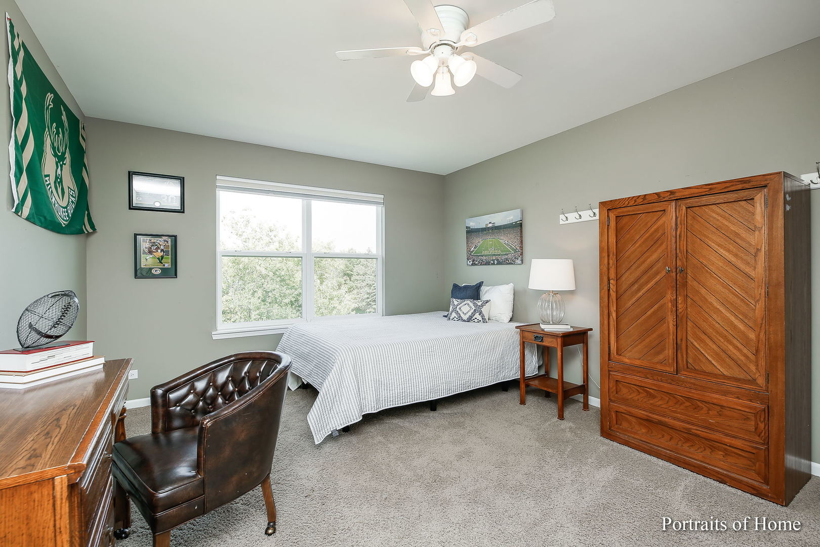 27-w030 Churchill Road Winfield, IL 60190 - Photo 25 of 28 a bedroom with a bed and a chair