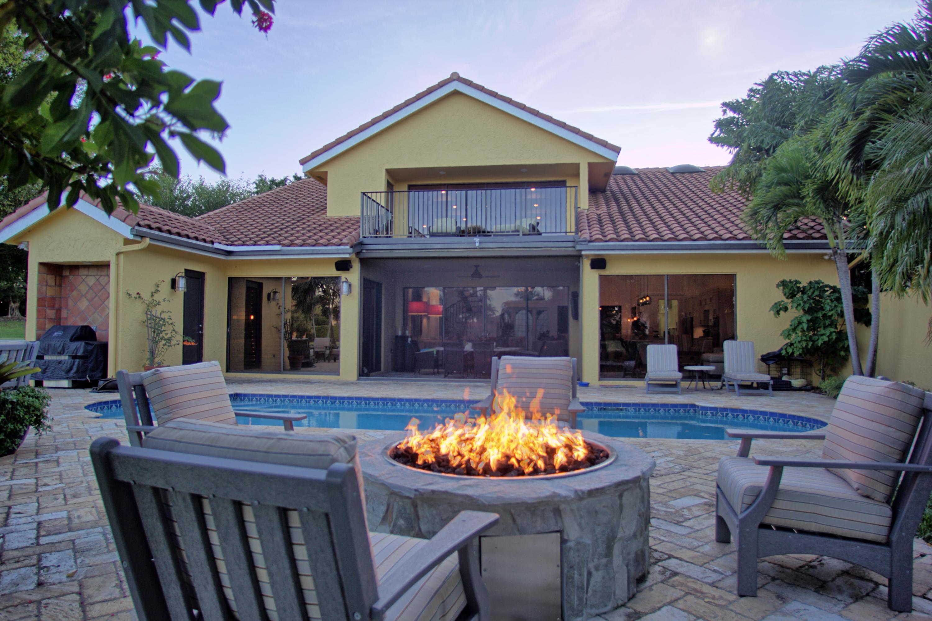 3000 Bent Cypress Road Wellington, FL 33414 - Photo 7 of 68 Fireplace with Exterior Back