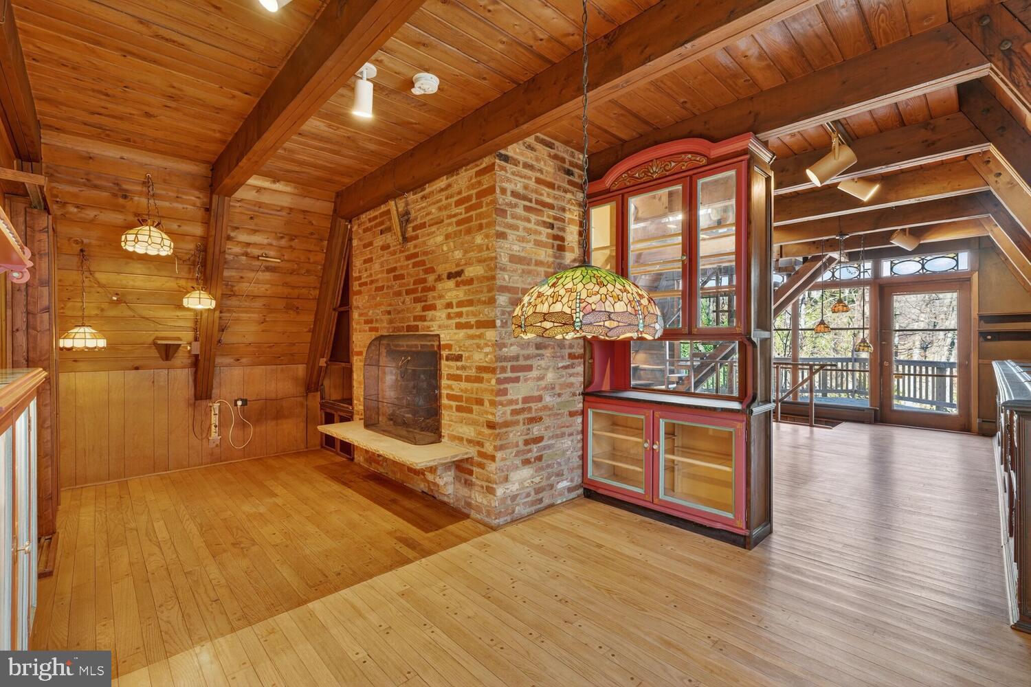 31 Hayward Court Takoma Park, MD 20912 - Photo 14 of 30 a view of an empty room with wooden floor and a window