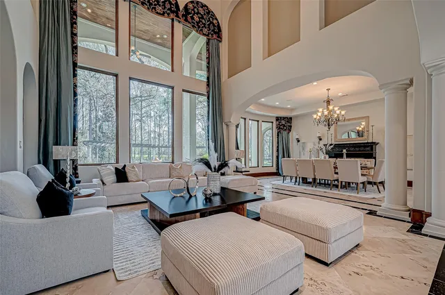 a living room with furniture fireplace and flat screen tv
