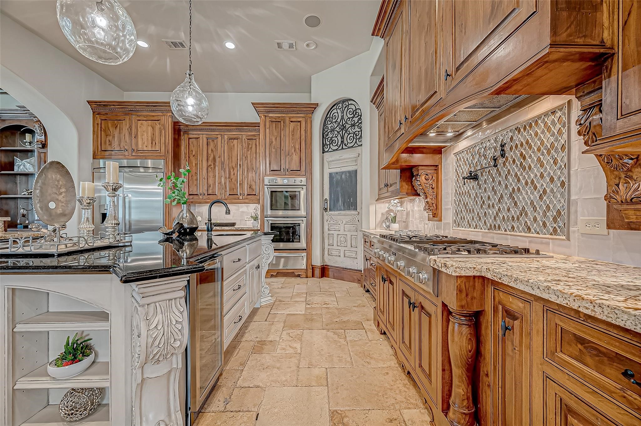 3 Congressional Circle Spring, TX 77389 - Photo 21 of 48 a kitchen with stainless steel appliances granite countertop a stove and a sink