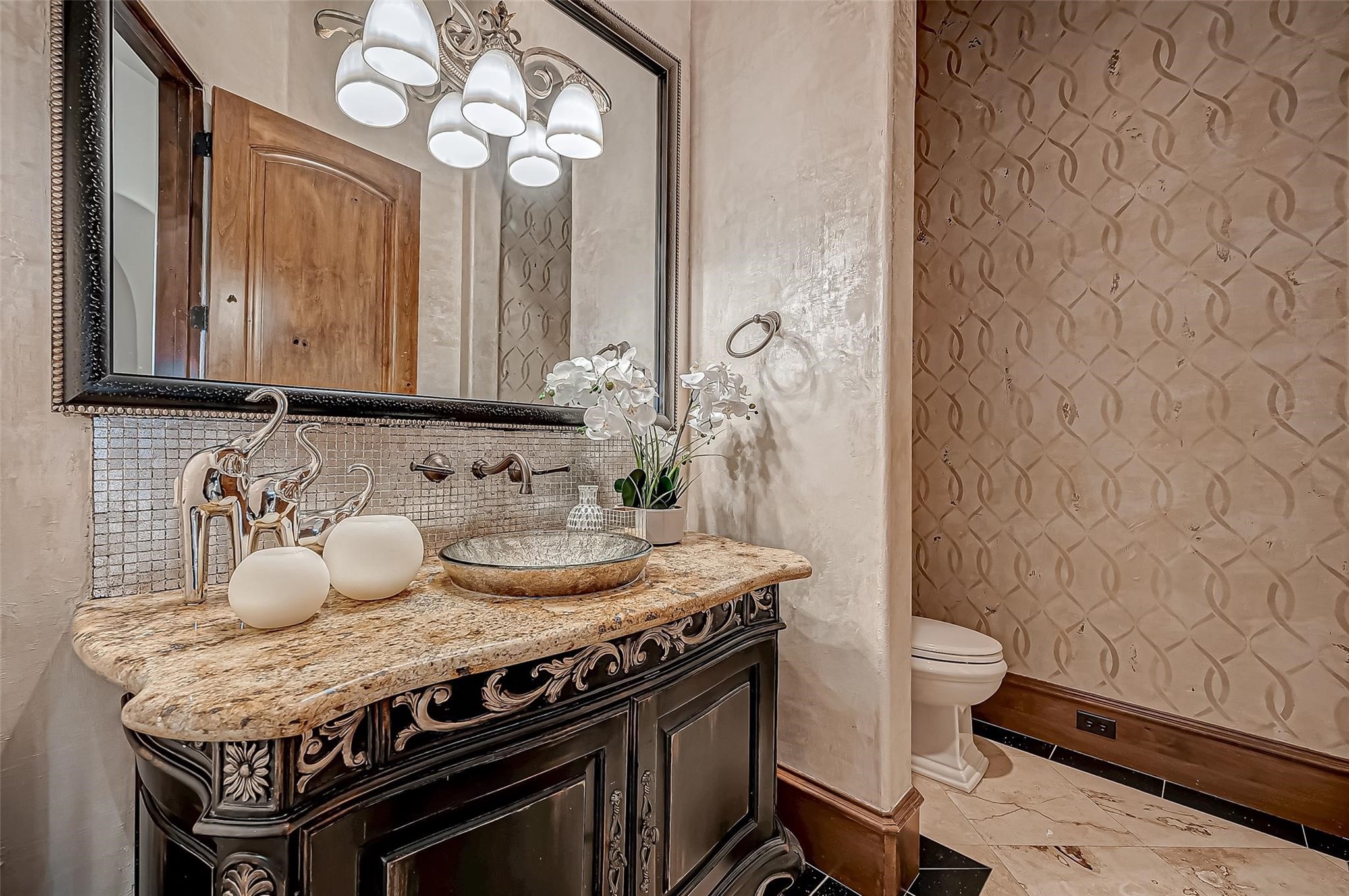 3 Congressional Circle Spring, TX 77389 - Photo 24 of 48 a bathroom with a granite countertop sink and a mirror