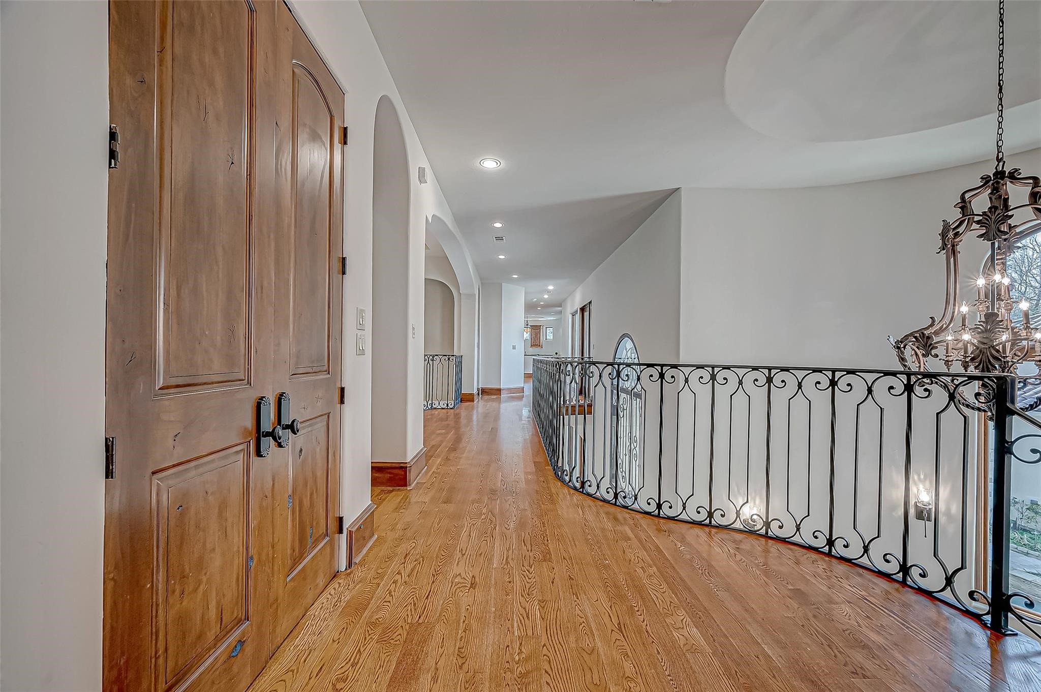 3 Congressional Circle Spring, TX 77389 - Photo 35 of 48 a view of a hallway with wooden floor