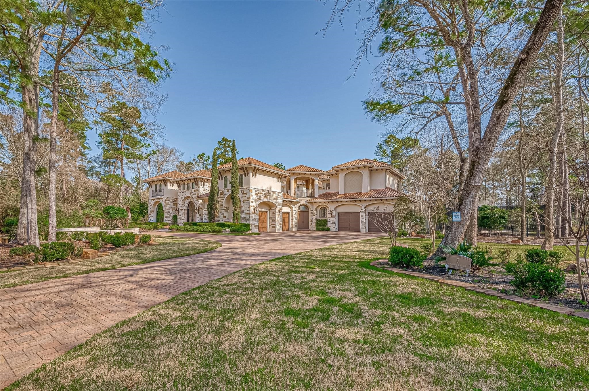 3 Congressional Circle Spring, TX 77389 - Photo 4 of 48 a front view of a house with a yard and trees