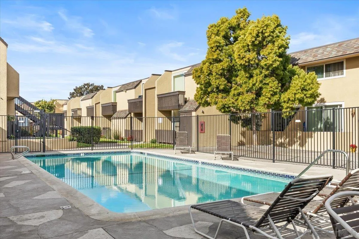6333 Mt Ada Road, Unit 279 San Diego, CA 92111 - Photo 16 of 21 a view of a swimming pool with a patio
