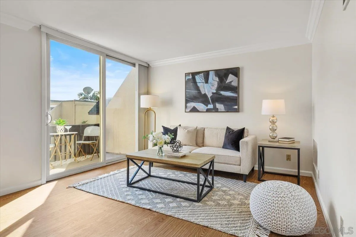 6333 Mt Ada Road, Unit 279 San Diego, CA 92111 - Photo 3 of 21 a living room with furniture and a window