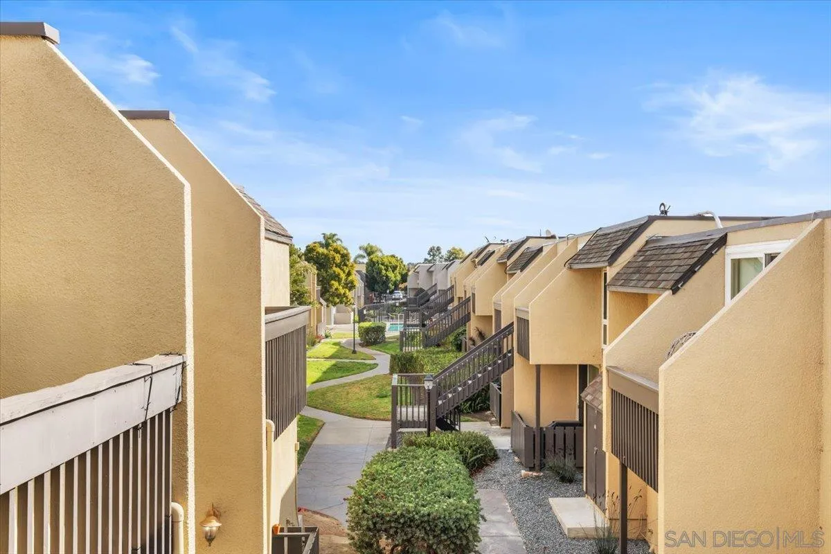 6333 Mt Ada Road, Unit 279 San Diego, CA 92111 - Photo 5 of 21 a view of a house with a backyard