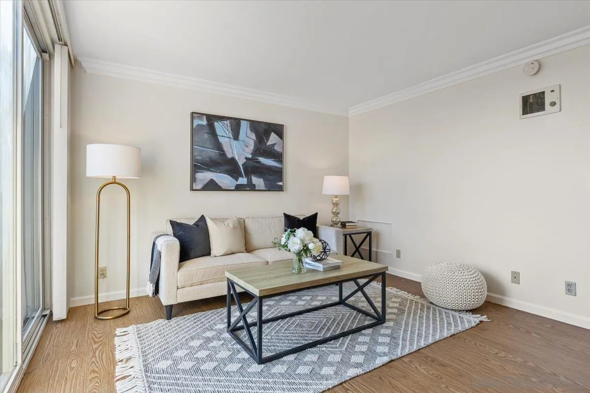 6333 Mt Ada Road, Unit 279 San Diego, CA 92111 - Photo 6 of 21 a living room with furniture and a rug