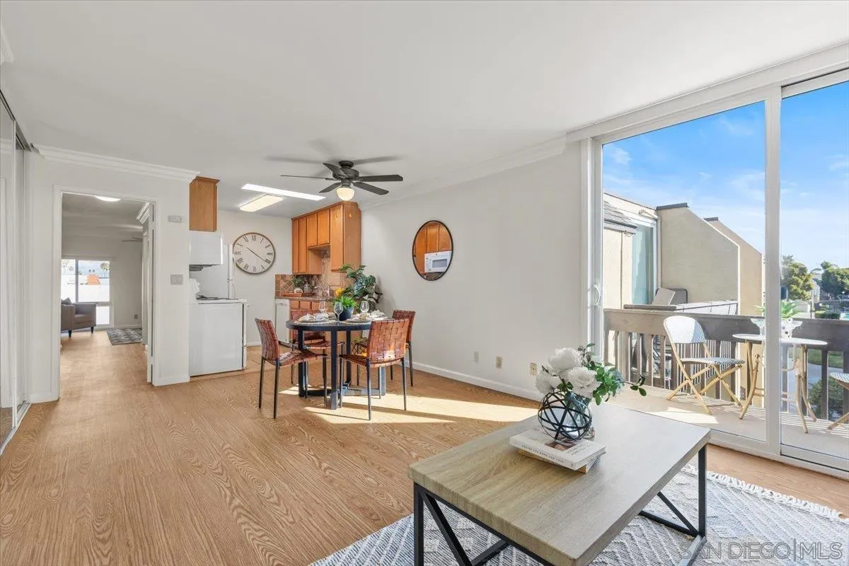 6333 Mt Ada Road, Unit 279 San Diego, CA 92111 - Photo 7 of 21 a living room with furniture and wooden floor