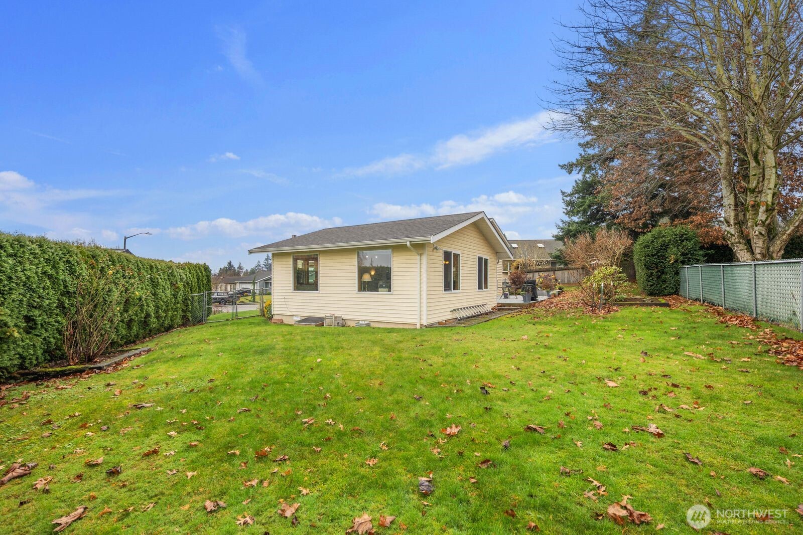 5874 Sherry Place Ferndale, WA 98248 - Photo 22 of 27 a front view of a house with yard and green space