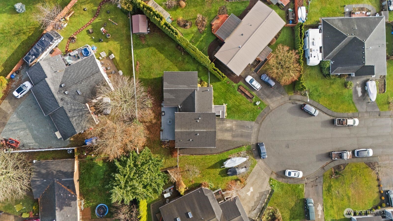 5874 Sherry Place Ferndale, WA 98248 - Photo 24 of 27 an aerial view of a house with a yard and large tree