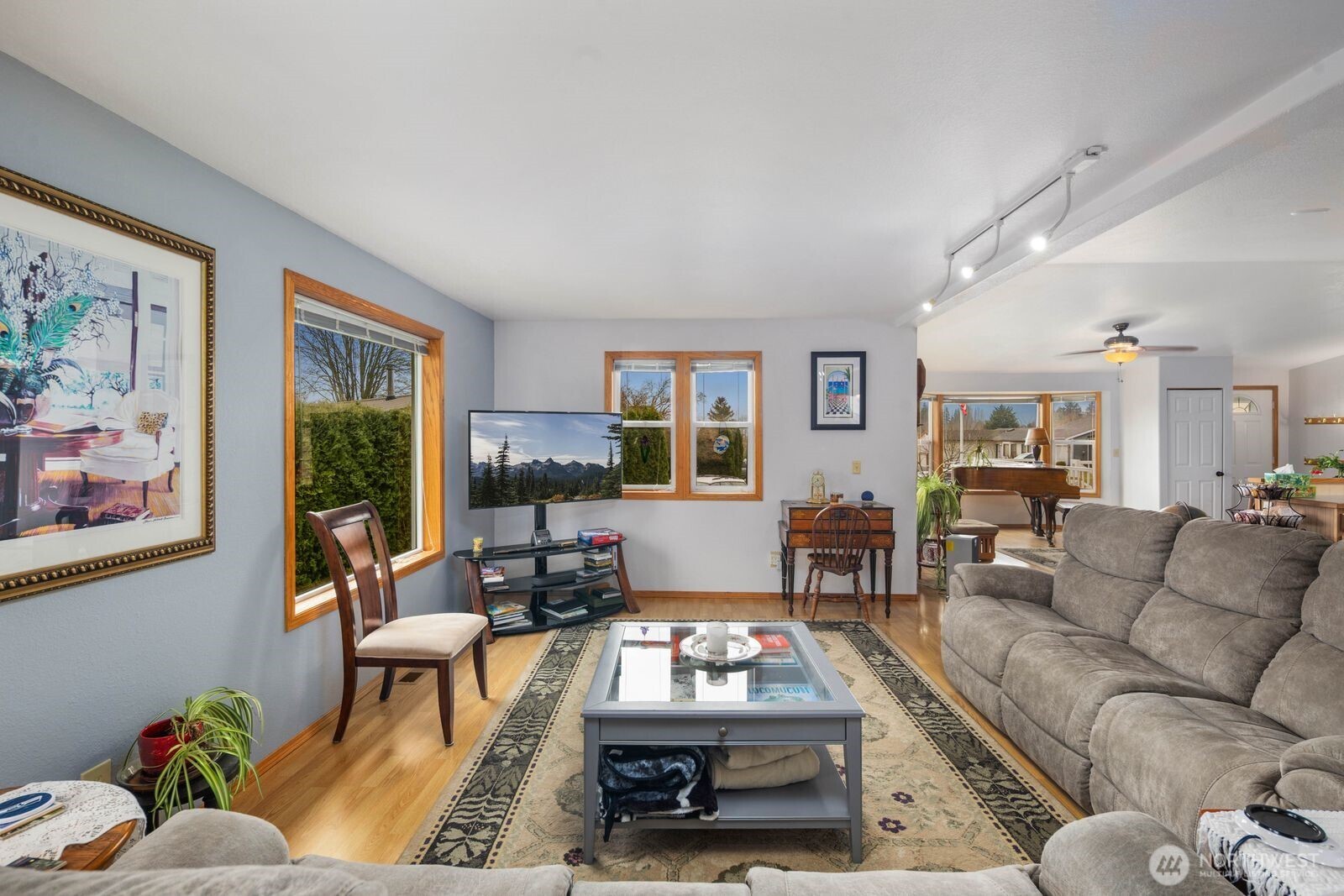 5874 Sherry Place Ferndale, WA 98248 - Photo 8 of 27 a living room with furniture and a flat screen tv