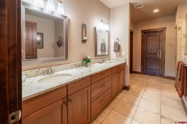 a bathroom with a bathtub and a sink